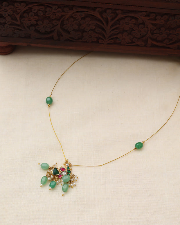 Invisible peacock necklace