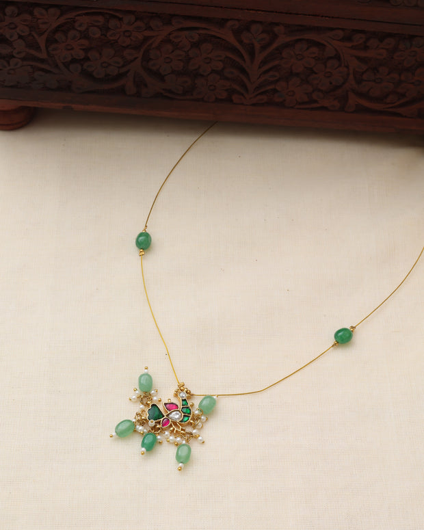 Invisible peacock necklace