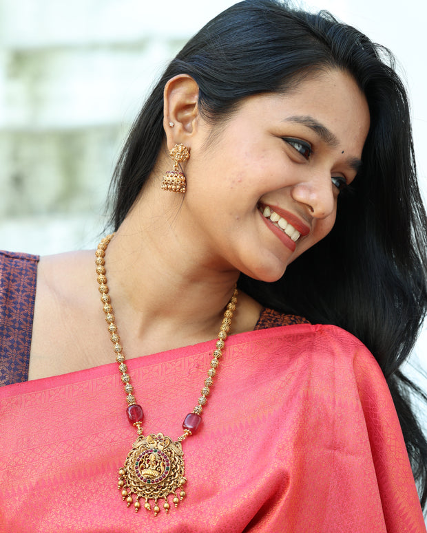 Antique Golden Beads Haaram With Stone Embedded Lakshmi Pendant