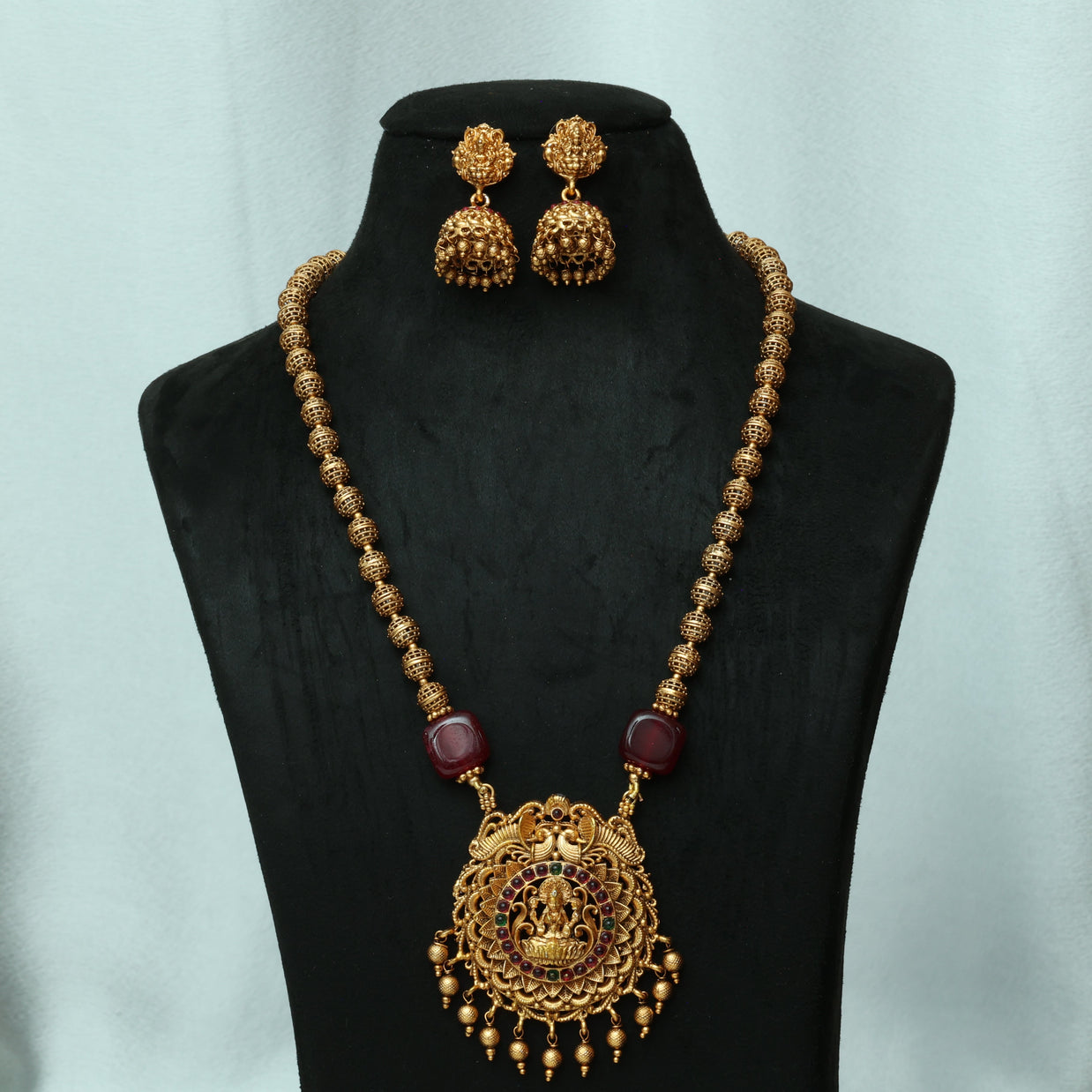 Antique Golden Beads Haaram With Stone Embedded Lakshmi Pendant