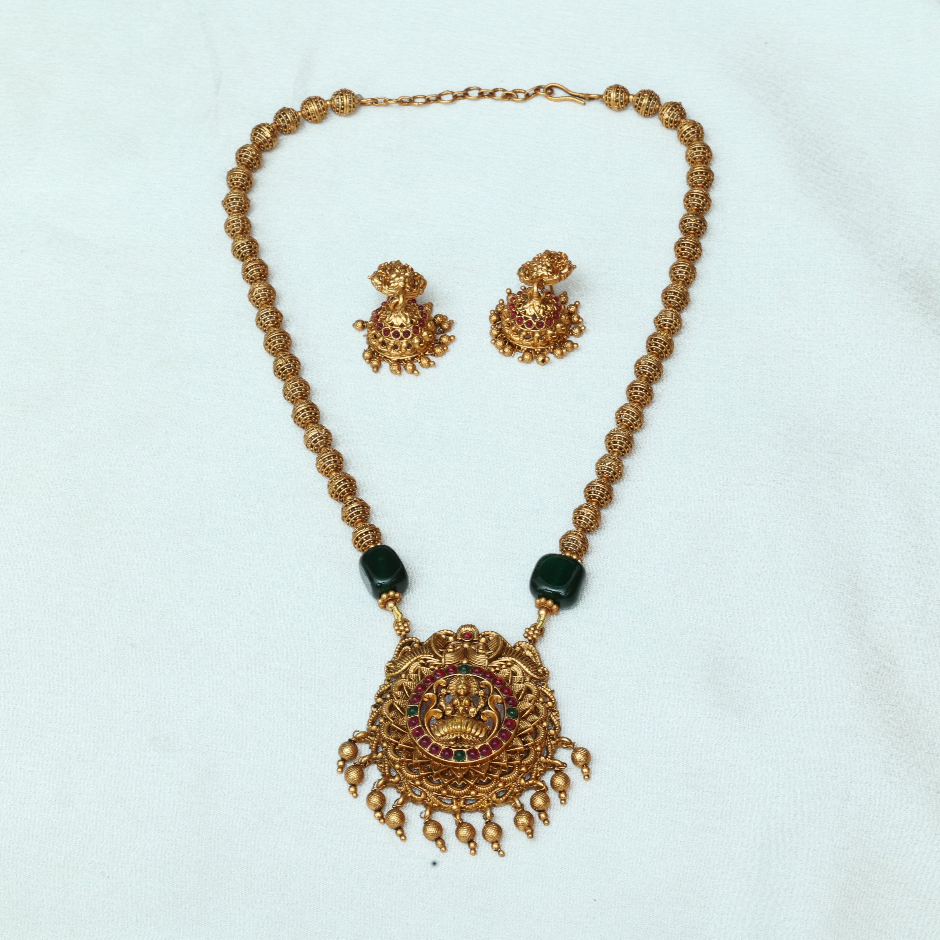 Antique Golden Beads Haaram With Stone Embedded Lakshmi Pendant