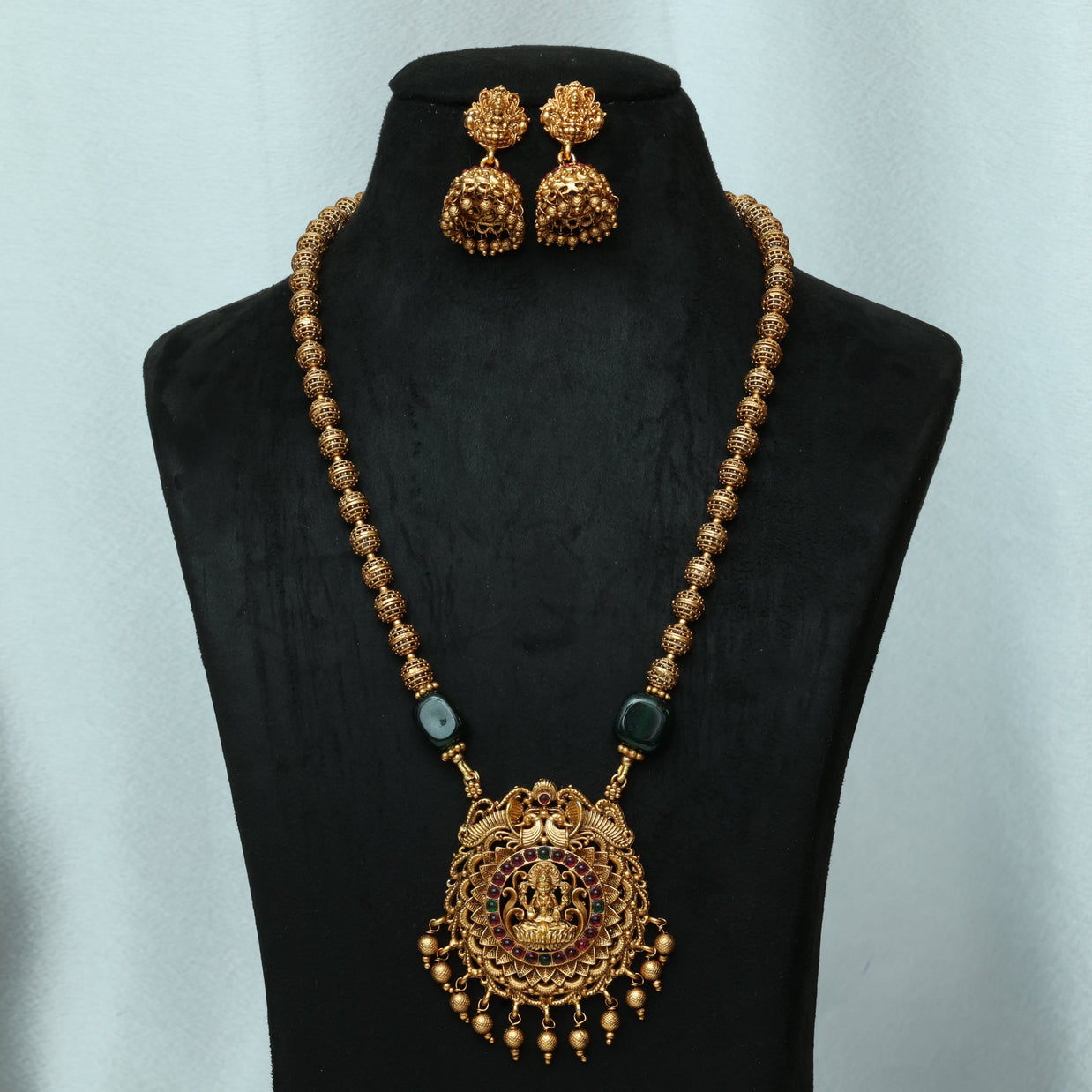 Antique Golden Beads Haaram With Stone Embedded Lakshmi Pendant